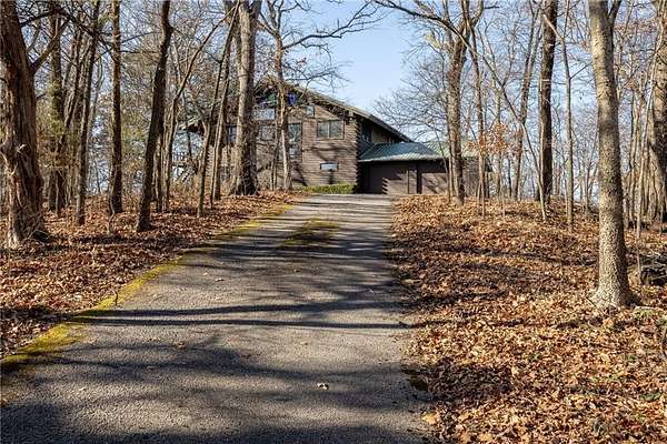 148 Acres of Recreational Land with Home for Sale in Noel, Missouri