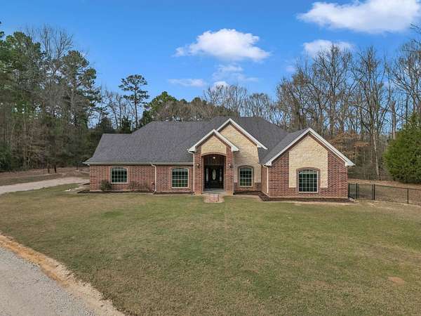 2 Acres of Residential Land with Home for Sale in Beckville, Texas