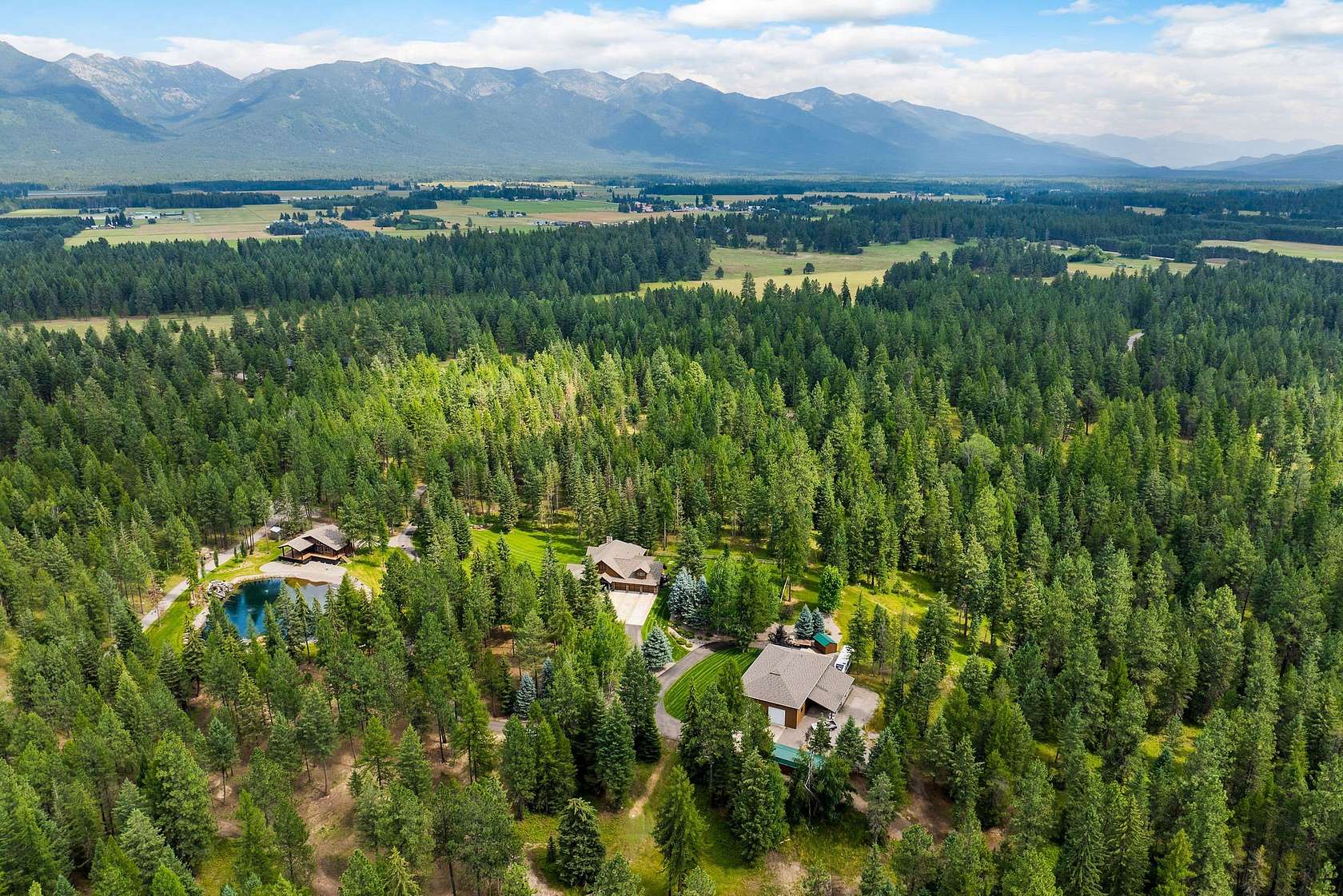 55.9 Acres of Recreational Land with Home for Sale in Bigfork, Montana