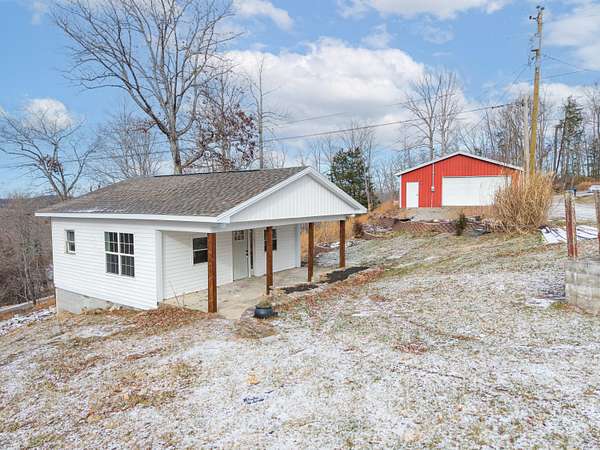 0.7 Acres of Residential Land with Home for Sale in Burnside, Kentucky
