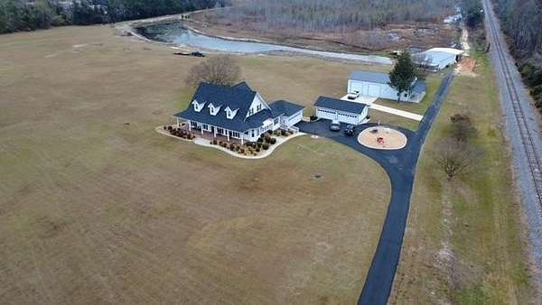 39.4 Acres of Land with Home for Sale in Dasher, Georgia