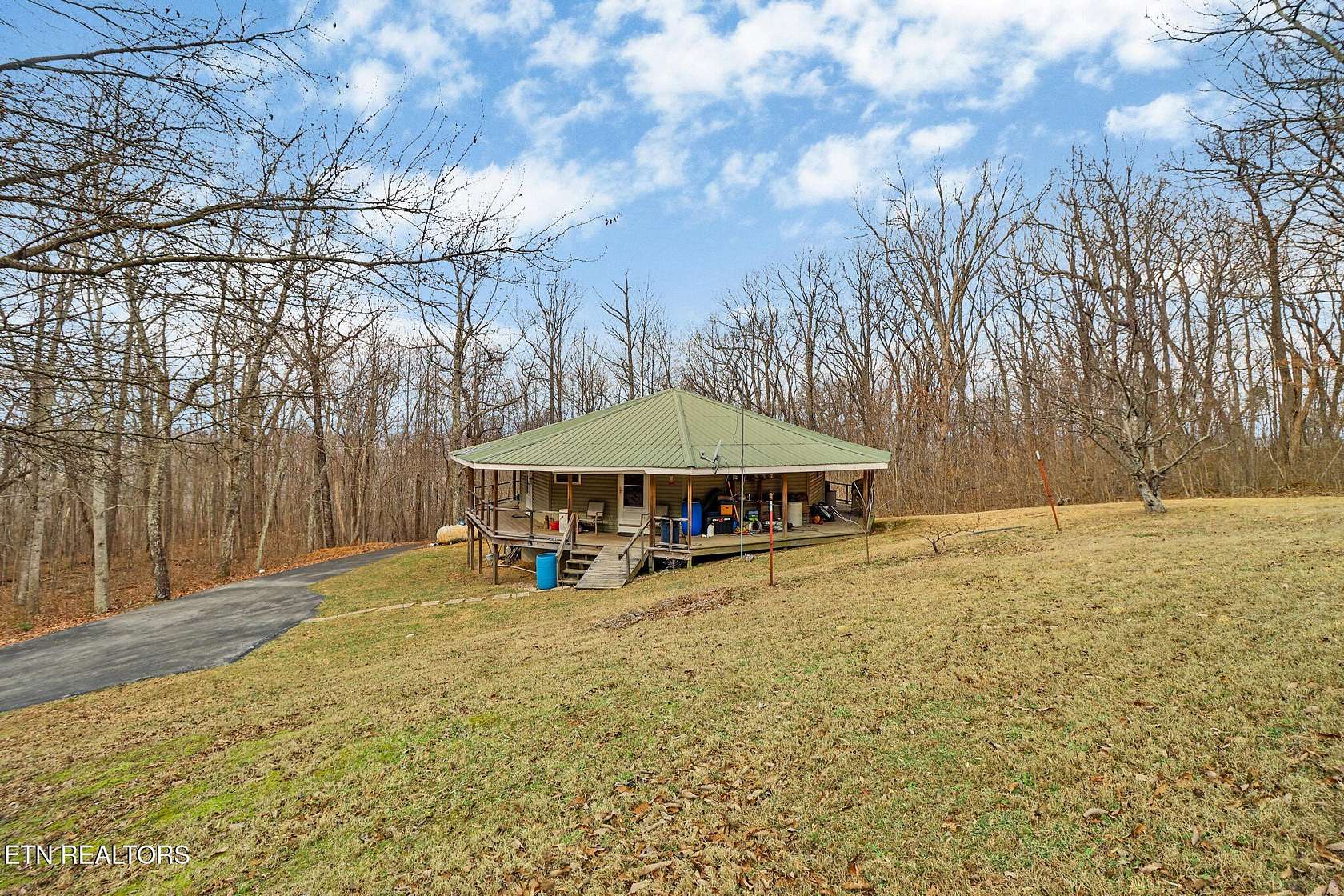 93 Acres of Recreational Land with Home for Sale in Crossville, Tennessee