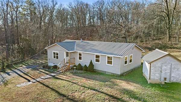 5 Acres of Residential Land with Home for Sale in Watts, Oklahoma