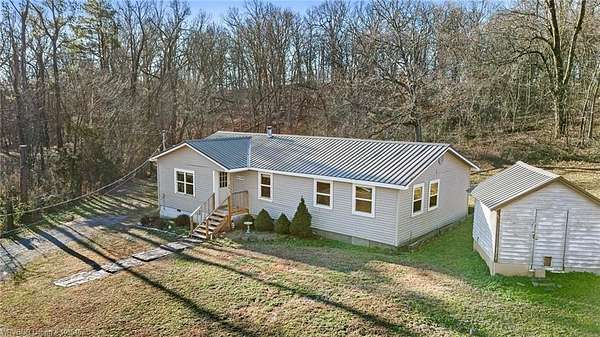 5 Acres of Residential Land with Home for Sale in Watts, Oklahoma