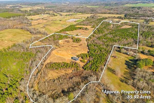 86 Acres of Land with Home for Sale in Crandall, Georgia