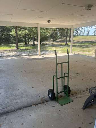 5.8 Acres of Residential Land with Home for Sale in Millry, Alabama