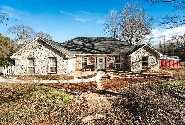 7.27 Acres of Land with Home for Sale in Lindale, Texas