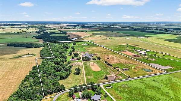55.3 Acres of Agricultural Land with Home for Sale in Collinsville, Texas