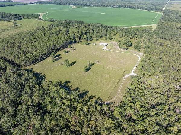 20 Acres of Land with Home for Sale in O'Brien, Florida
