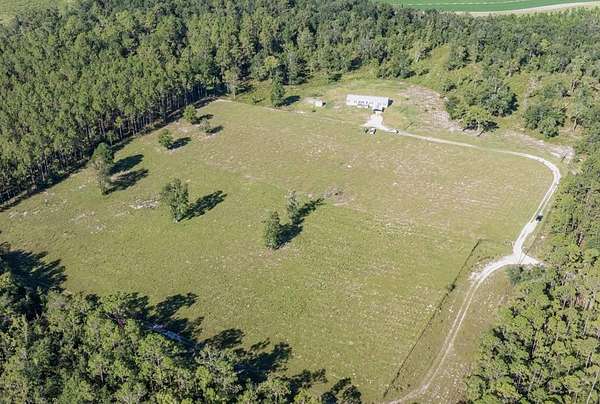 20 Acres of Land with Home for Sale in O'Brien, Florida