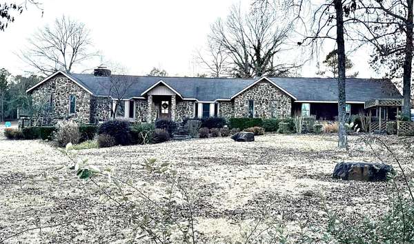 7 Acres of Residential Land with Home for Sale in Knoxville, Arkansas