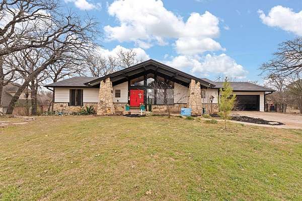 1.56 Acres of Residential Land with Home for Sale in Keene, Texas