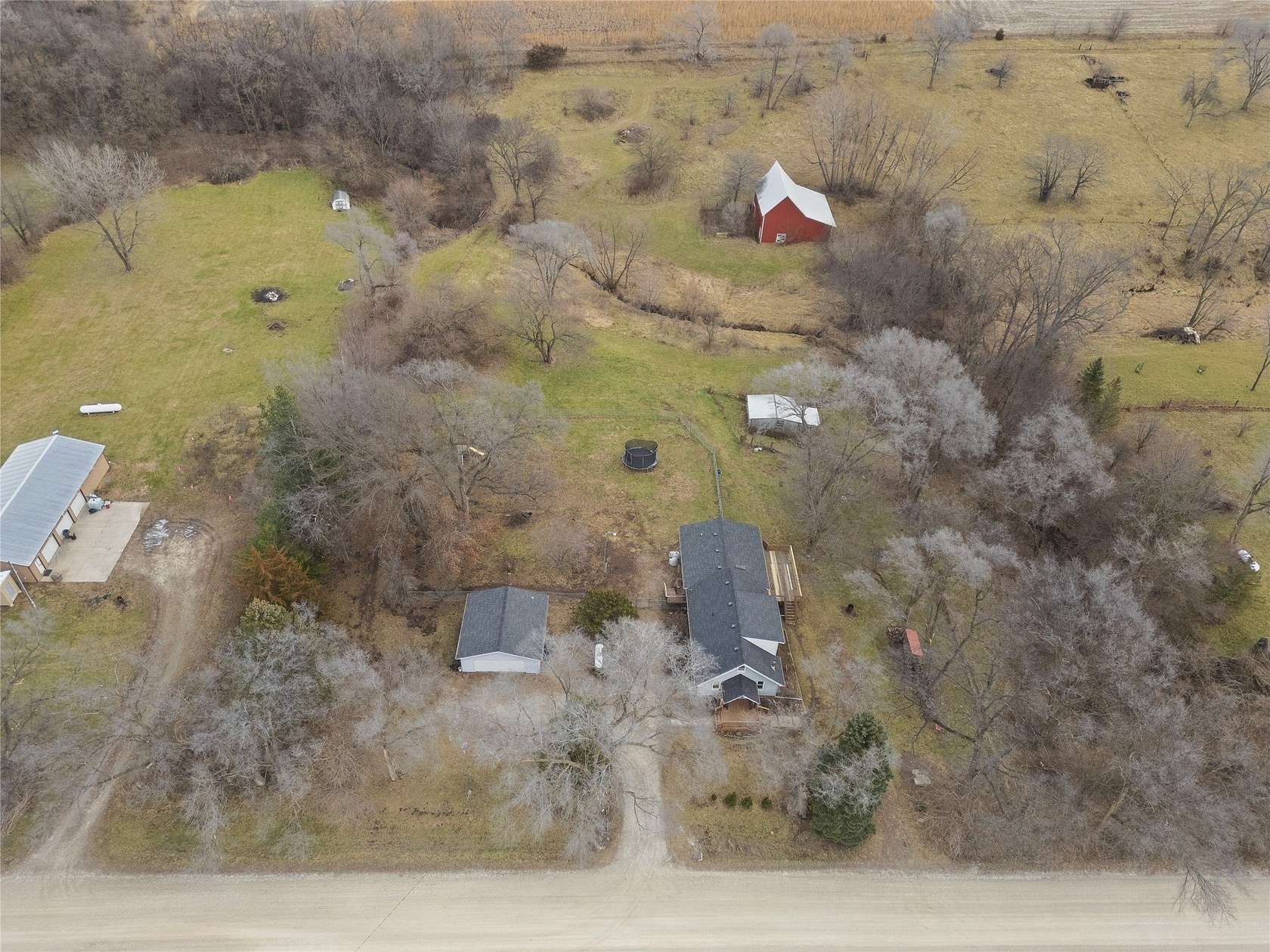 4.4 Acres of Residential Land with Home for Sale in Carlisle, Iowa