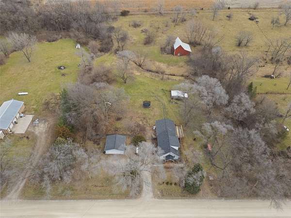 4.4 Acres of Residential Land with Home for Sale in Carlisle, Iowa
