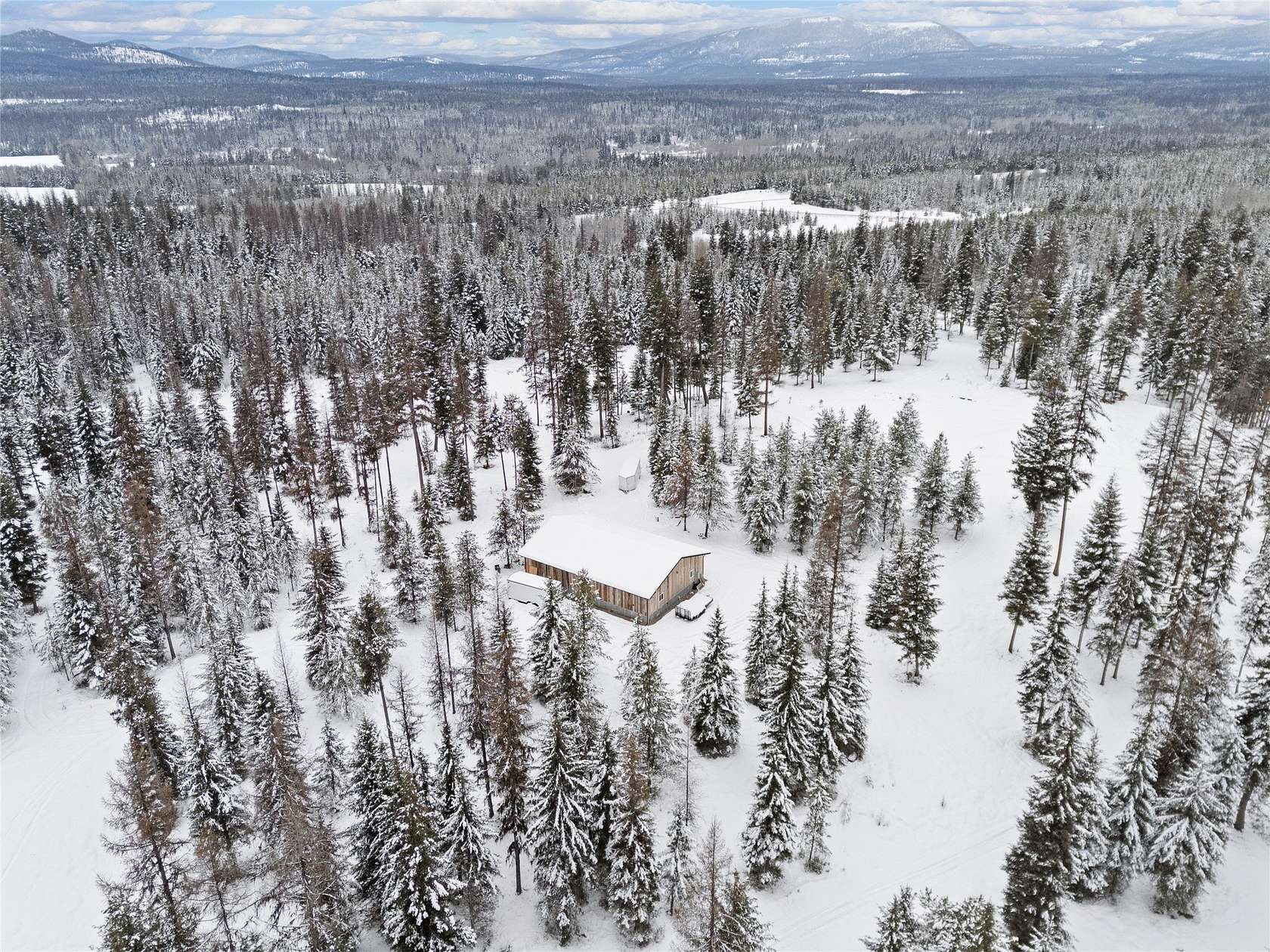 116 Acres of Recreational Land with Home for Sale in Whitefish, Montana