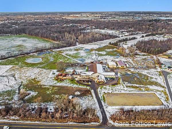 16.9 Acres of Land with Home for Sale in Grandville, Michigan