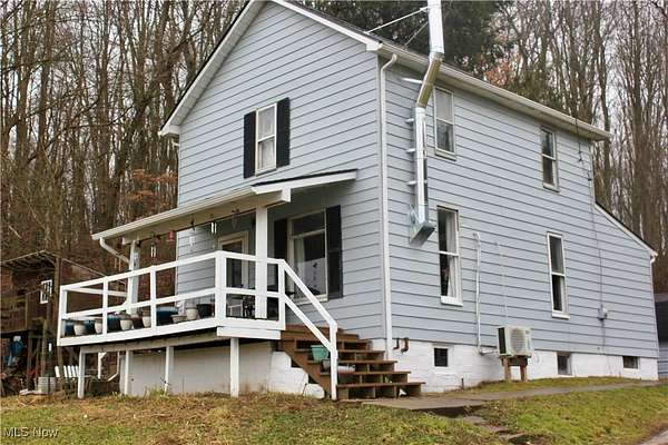 1.79 Acres of Residential Land with Home for Sale in Minerva, Ohio