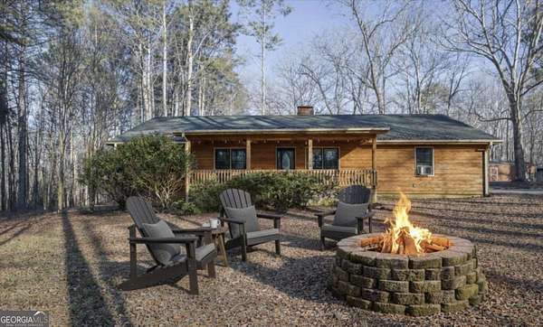 5.6 Acres of Land with Home for Sale in Cumming, Georgia