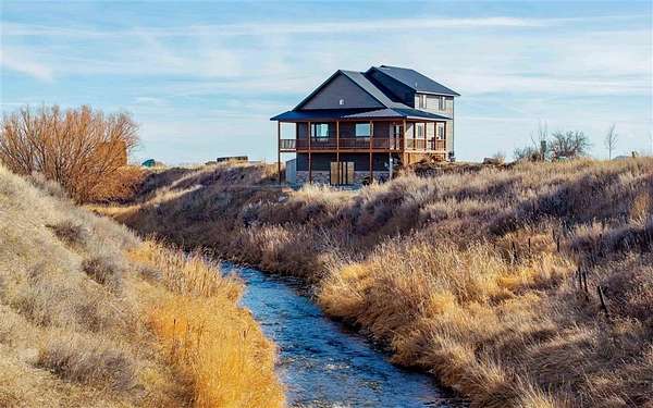 45 Acres of Agricultural Land with Home for Sale in Powell, Wyoming