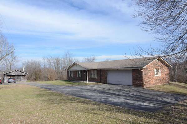 5.7 Acres of Residential Land with Home for Sale in Winchester, Kentucky