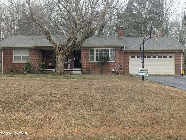 3.3 Acres of Residential Land with Home for Sale in Beech Bluff, Tennessee