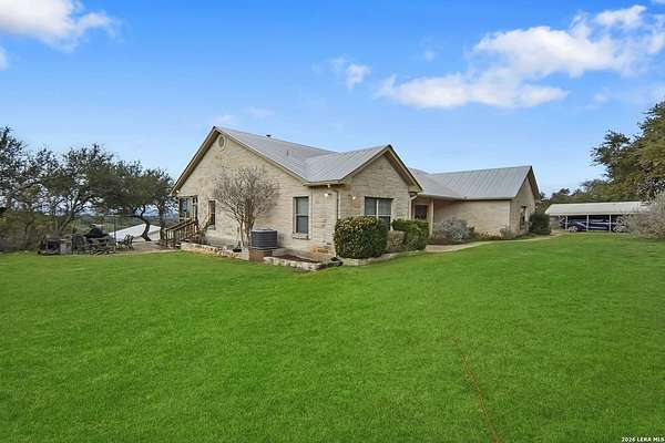 2.1 Acres of Residential Land with Home for Sale in Canyon Lake, Texas