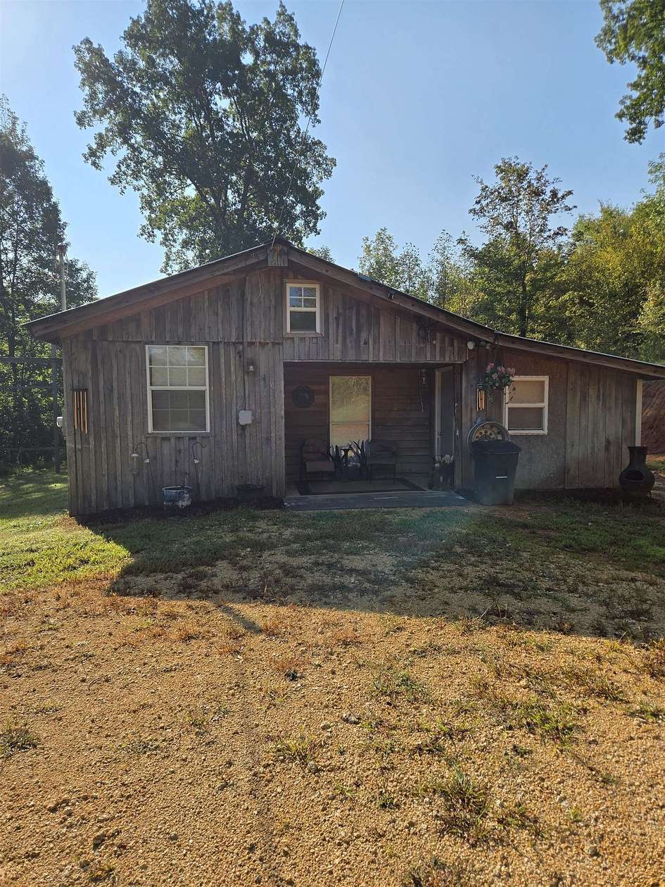 6.4 Acres of Land with Home for Sale in Savannah, Tennessee