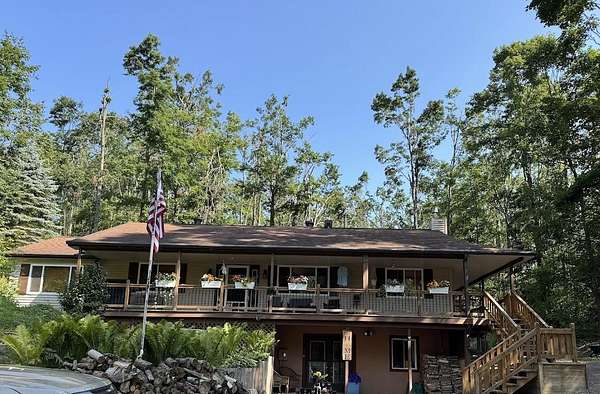 14.6 Acres of Land with Home for Sale in Vanderbilt, Michigan