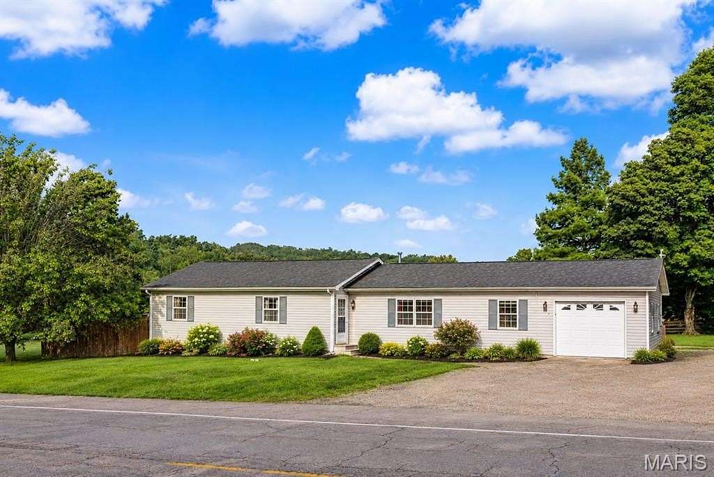 1.76 Acres of Land with Home for Sale in Marble Hill, Missouri