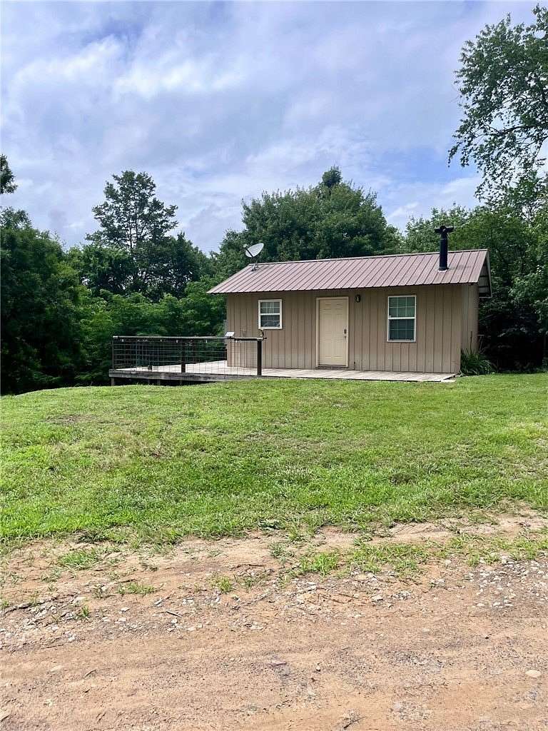 9 Acres of Land with Home for Sale in Oark, Arkansas