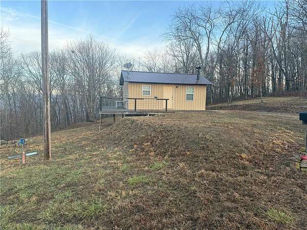 9 Acres of Land with Home for Sale in Oark, Arkansas