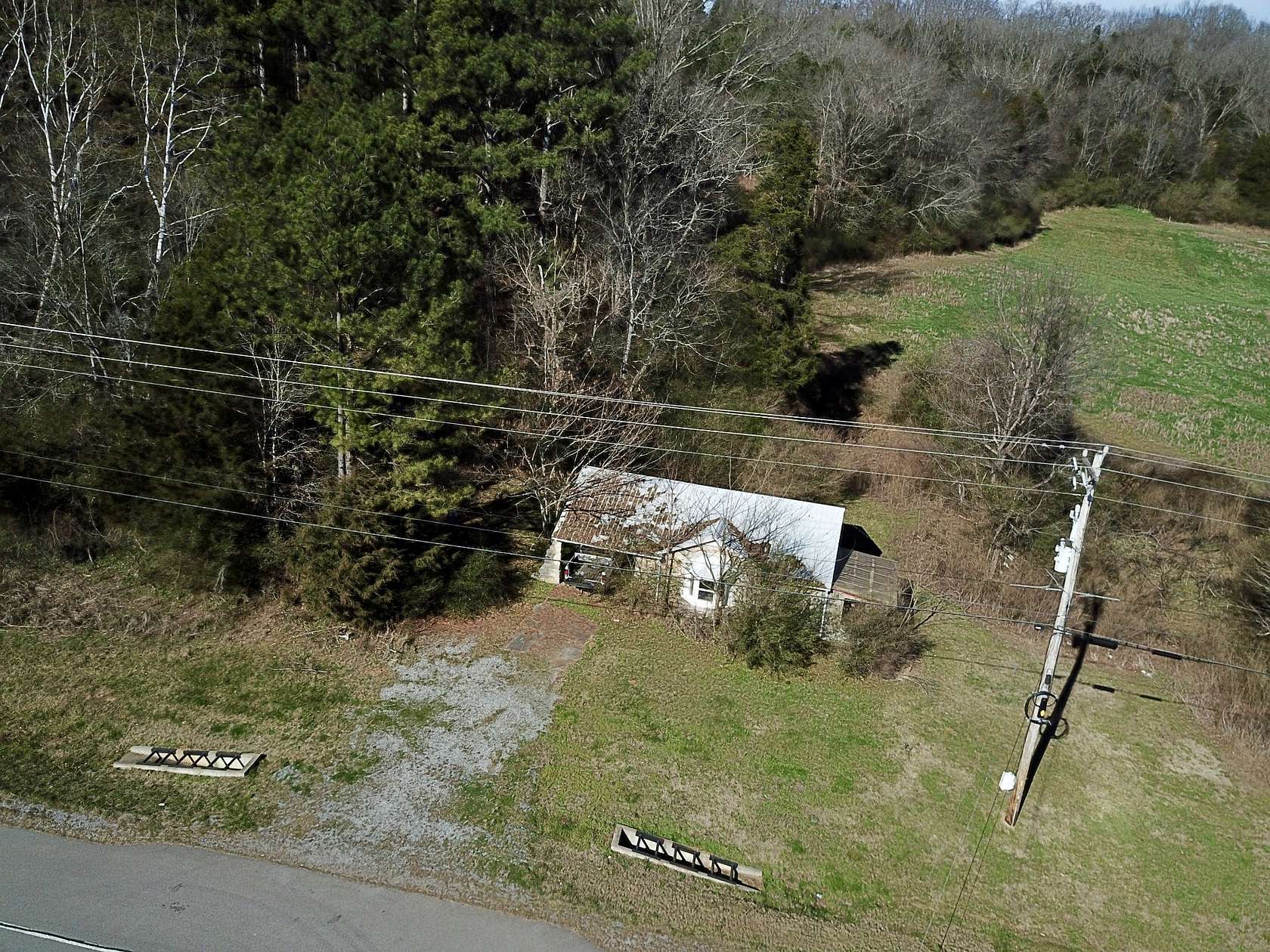 1.6 Acres of Residential Land with Home for Sale in Centerville, Tennessee