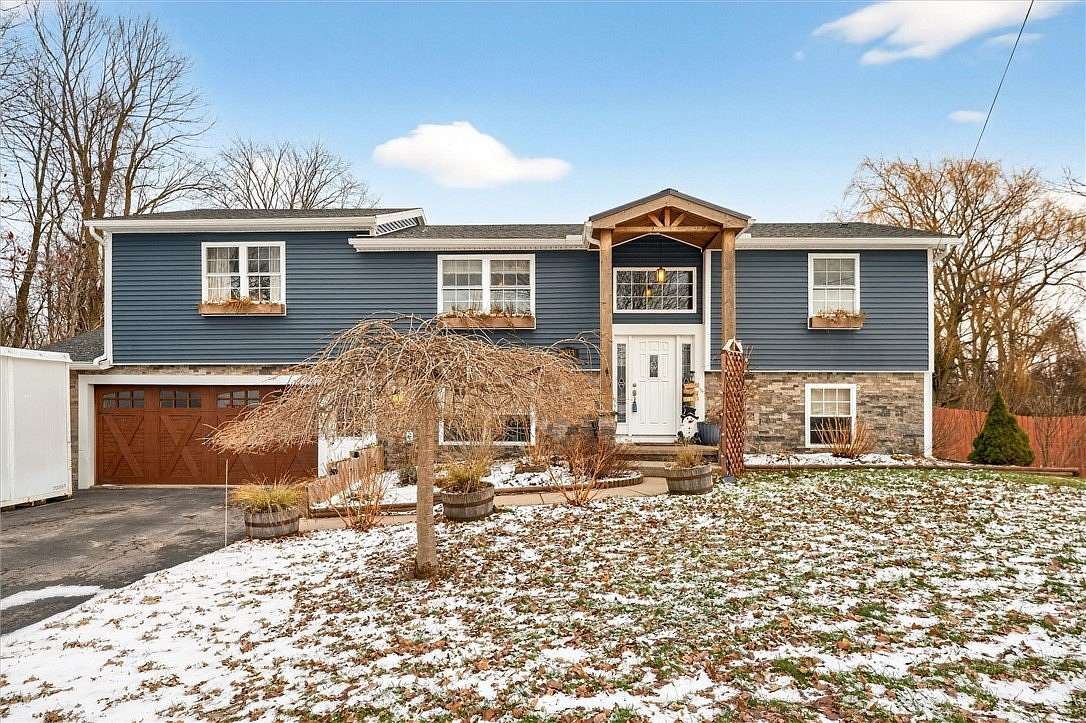 3.7 Acres of Residential Land with Home for Sale in Holley, New York