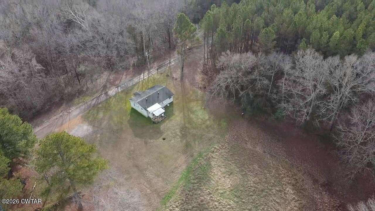 2 Acres of Residential Land with Home for Sale in Hickory Valley, Tennessee