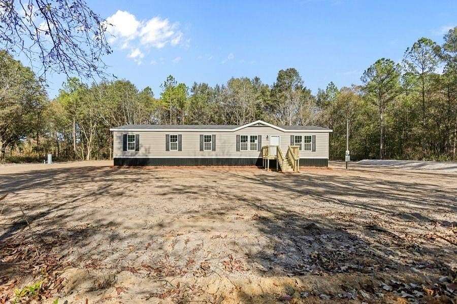 3.28 Acres of Land with Home for Sale in Ludowici, Georgia
