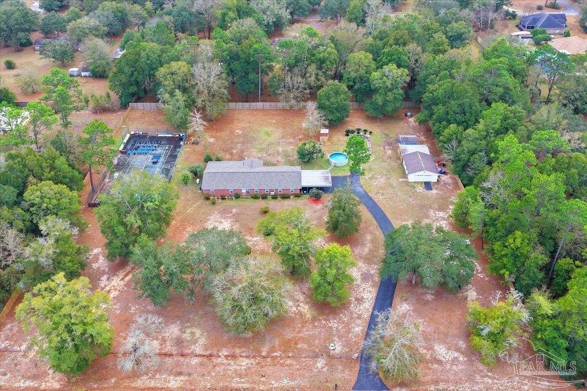 2.5 Acres of Land with Home for Sale in Milton, Florida