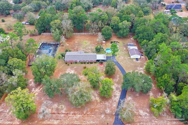 2.5 Acres of Residential Land with Home for Sale in Milton, Florida