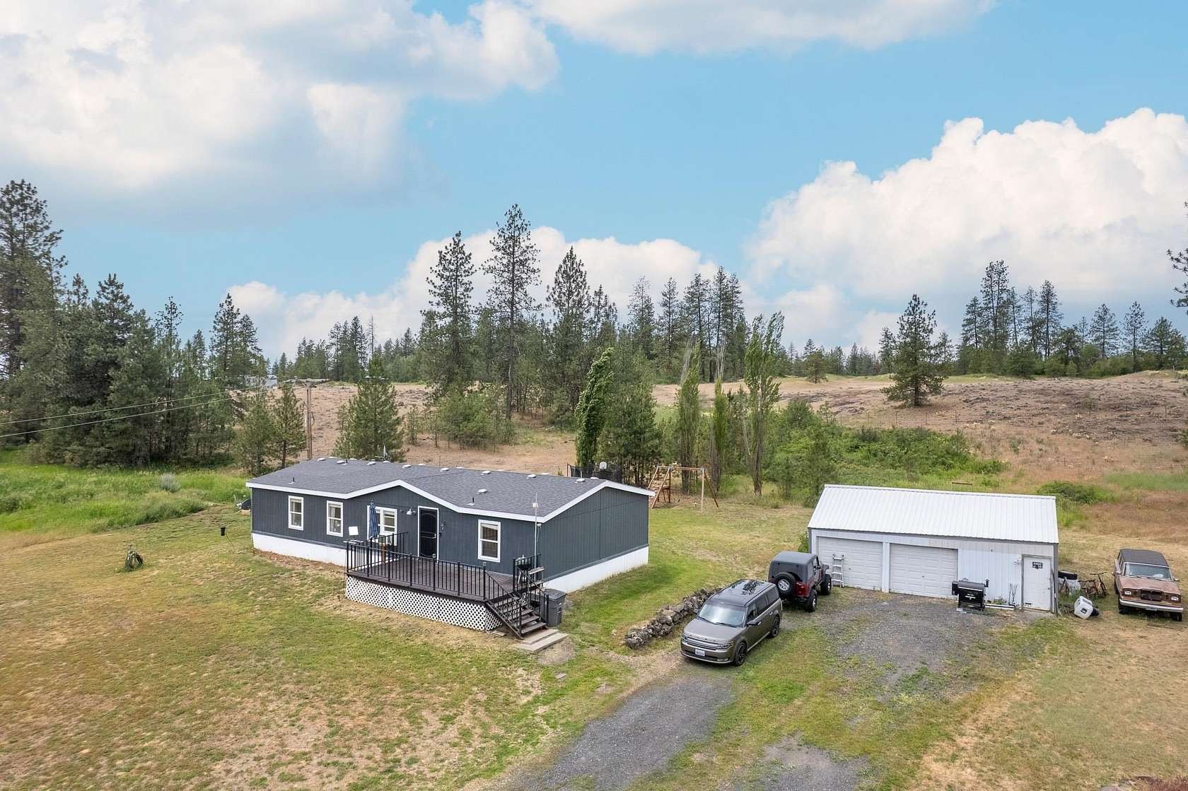 9.77 Acres of Residential Land with Home for Sale in Spokane, Washington