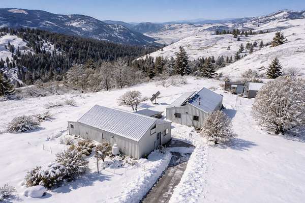 27.8 Acres of Recreational Land with Home for Sale in Curlew, Washington