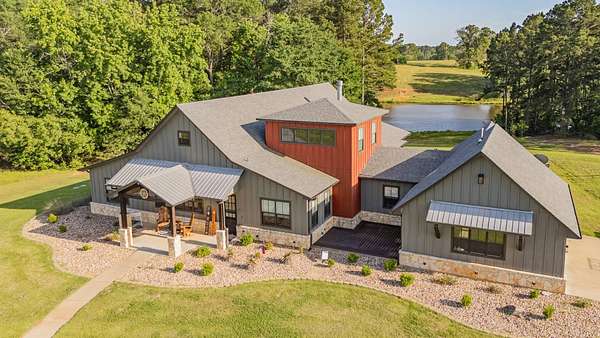 165 Acres of Recreational Land with Home for Sale in Gladewater, Texas