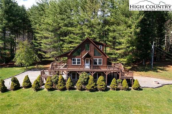 2.74 Acres of Residential Land with Home for Sale in Grassy Creek, North Carolina