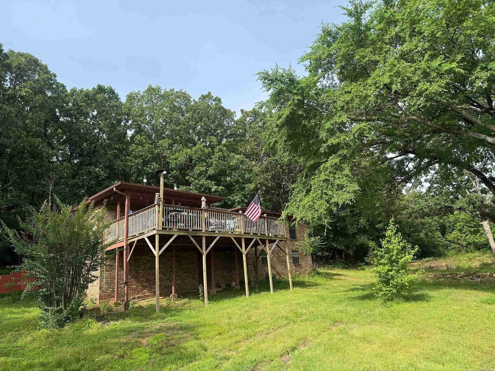 11 Acres of Land with Home for Sale in Clarksville, Arkansas