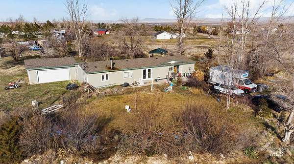 2.23 Acres of Residential Land with Home for Sale in Mountain Home, Idaho