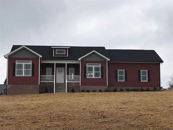 2.52 Acres of Residential Land with Home for Sale in Charlotte, Tennessee