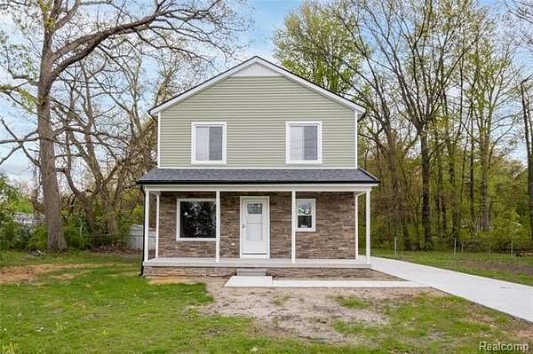 2.35 Acres of Land with Home for Sale in Romulus, Michigan