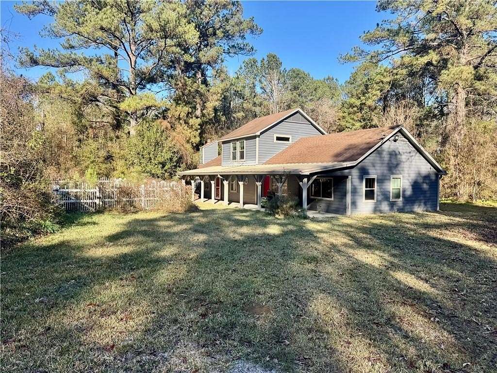 9.3 Acres of Land with Home for Sale in Wilmer, Alabama