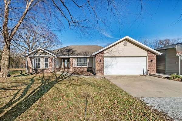 2.14 Acres of Residential Land with Home for Sale in Gravette, Arkansas