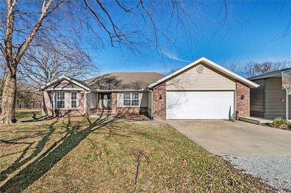 2.14 Acres of Land with Home for Sale in Gravette, Arkansas