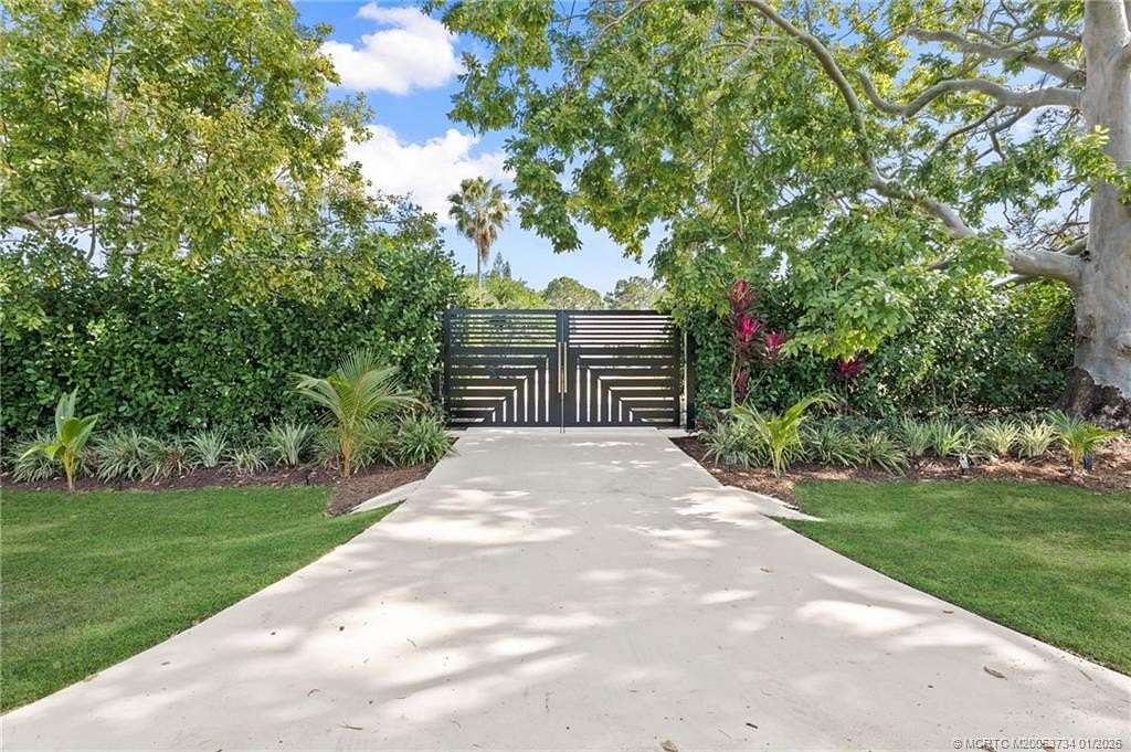 3.47 Acres of Residential Land with Home for Sale in Palm City, Florida