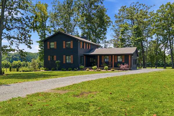 2 Acres of Land with Home for Sale in Cottontown, Tennessee